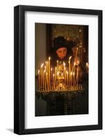 Woman lighting a candle, Trinity Cathedral-Godong-Framed Photographic Print