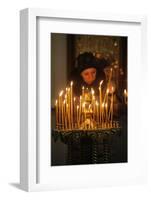 Woman lighting a candle, Trinity Cathedral-Godong-Framed Photographic Print