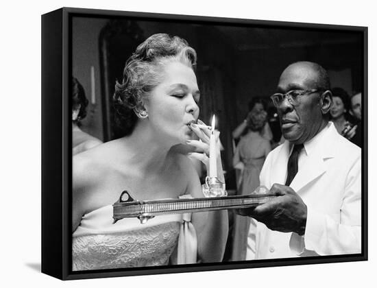 Woman Lighting a Cigarette from a Candle Held by a Waiter at the Piedmont Ball-Paul Schutzer-Framed Stretched Canvas