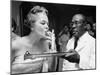 Woman Lighting a Cigarette from a Candle Held by a Waiter at the Piedmont Ball-Paul Schutzer-Mounted Photographic Print