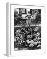 Woman Looking at Victory Garden Harvest Sitting on Lawn, Waiting to Be Stored Away for Winter-Walter Sanders-Framed Photographic Print