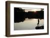 Woman looking out across a lake in rural Finland-David Pickford-Framed Premium Photographic Print