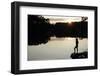 Woman looking out across a lake in rural Finland-David Pickford-Framed Premium Photographic Print