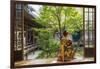 Woman looking out onto Zen garden, Kyoto, Japan-Peter Adams-Framed Photographic Print