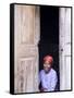 Woman Looks Out from Her Doorway on Ilha Do Mozambique-Julian Love-Framed Stretched Canvas