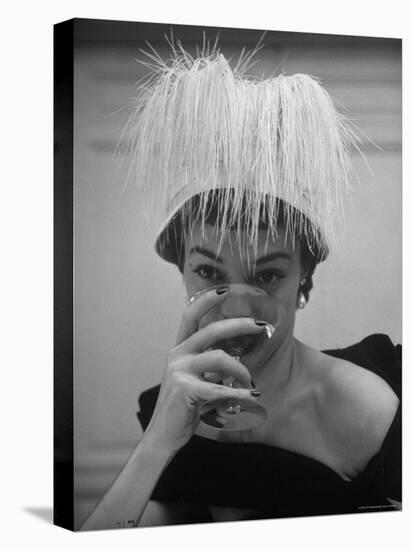 Woman Modeling White Satin Hat, with White Glycerin Feathers to Flatter Low Draped Neckline-Nina Leen-Stretched Canvas