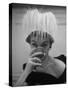 Woman Modeling White Satin Hat, with White Glycerin Feathers to Flatter Low Draped Neckline-Nina Leen-Stretched Canvas