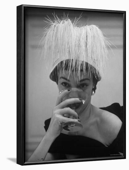 Woman Modeling White Satin Hat, with White Glycerin Feathers to Flatter Low Draped Neckline-Nina Leen-Framed Photographic Print