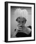 Woman Modeling White Satin Hat, with White Glycerin Feathers to Flatter Low Draped Neckline-Nina Leen-Framed Photographic Print