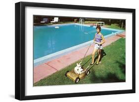 Woman Mowing Lawn by Pool, Retro-null-Framed Art Print