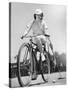 Woman on a Bicycle Playing Polo-null-Stretched Canvas