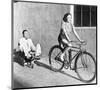 Woman on Bicycle Man Tricycle-null-Mounted Art Print