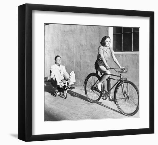 Woman on Bicycle Man Tricycle-null-Framed Art Print