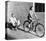 Woman on Bicycle Man Tricycle-null-Stretched Canvas