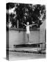 Woman on Diving Board at Swimming Pool-null-Stretched Canvas