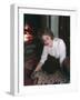 Woman on Rug by Fire-Charles Woof-Framed Photographic Print