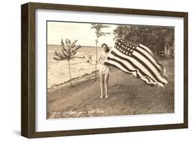 Woman on Shore Holding Flag-null-Framed Art Print