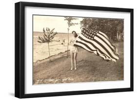 Woman on Shore Holding Flag-null-Framed Art Print