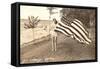 Woman on Shore Holding Flag-null-Framed Stretched Canvas