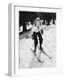 Woman on Skiis with Knees Bent-null-Framed Photo
