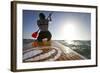 Woman on Stand Up Paddle-Board Heads into the Sunset at San Onofre Beach, San Clemente, California-Louis Arevalo-Framed Photographic Print