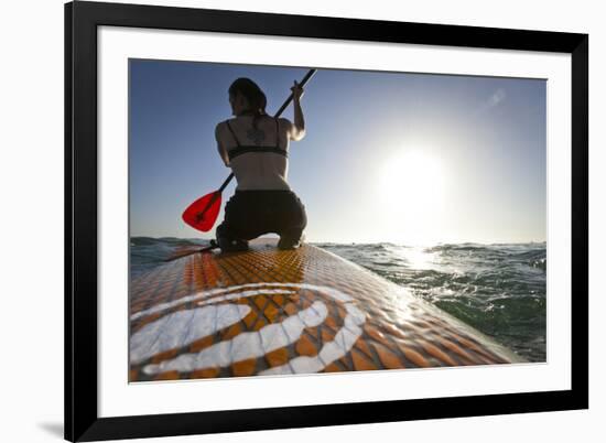 Woman on Stand Up Paddle-Board Heads into the Sunset at San Onofre Beach, San Clemente, California-Louis Arevalo-Framed Photographic Print