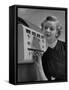 Woman Operating Coin-Operated Perfume Vending Machine-Nina Leen-Framed Stretched Canvas