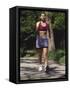 Woman Out on a Fitness Walk-Paul Sutton-Framed Stretched Canvas