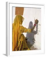 Woman Painting Design on a Wall in a Village Near Jaisalmer, Rajasthan State, India-Bruno Morandi-Framed Photographic Print