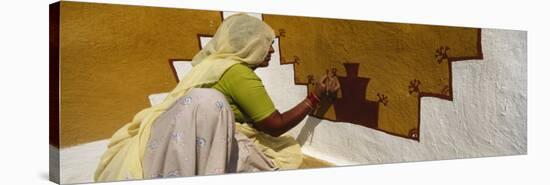 Woman Painting on a Wall, Thar Desert, Jaisalmer, Rajasthan, India-null-Stretched Canvas