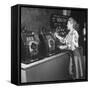 Woman Participating in WWII War Bond Rally in Gambling Casino-John Florea-Framed Stretched Canvas