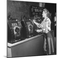 Woman Participating in WWII War Bond Rally in Gambling Casino-John Florea-Mounted Photographic Print