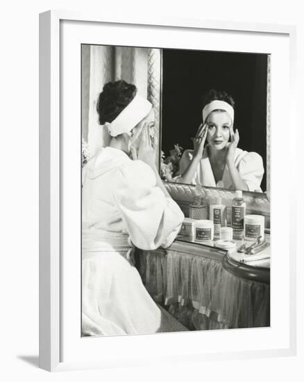 Woman Peeling Off Face Mask-null-Framed Photo