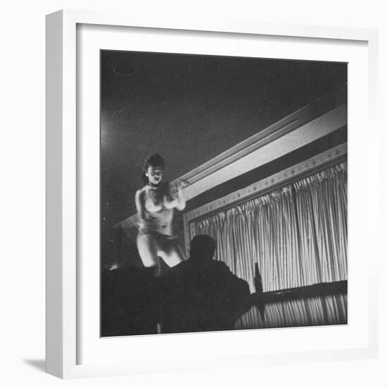 Woman Performing a Strip Tease Dance-null-Framed Photographic Print