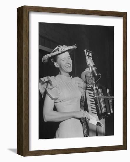 Woman Performing Onstage at the Grand Ole Opry-Ed Clark-Framed Photographic Print