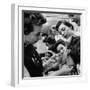 Woman Piercing Another Woman's Ears as Friends Look On-Robert W^ Kelley-Framed Photographic Print