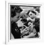 Woman Piercing Another Woman's Ears as Friends Look On-Robert W^ Kelley-Framed Photographic Print