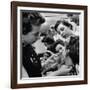 Woman Piercing Another Woman's Ears as Friends Look On-Robert W^ Kelley-Framed Photographic Print