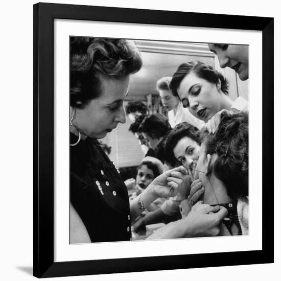 Woman Piercing Another Woman's Ears as Friends Look On-Robert W^ Kelley-Framed Photographic Print