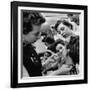 Woman Piercing Another Woman's Ears as Friends Look On-Robert W^ Kelley-Framed Photographic Print