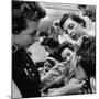 Woman Piercing Another Woman's Ears as Friends Look On-Robert W^ Kelley-Mounted Photographic Print