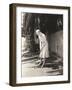 Woman Playing Miniature Golf-null-Framed Photo