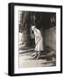 Woman Playing Miniature Golf-null-Framed Photo