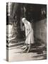 Woman Playing Miniature Golf-null-Stretched Canvas