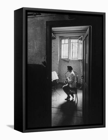 Woman Playing the Saxophone-Loomis Dean-Framed Stretched Canvas
