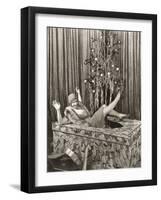 Woman Popping Out of Large Gift Box in Front of Christmas Tree-null-Framed Photo
