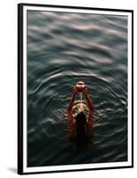 Woman Pouring Water During Morning Puja on Ganges, Varanasi, India-Anthony Plummer-Framed Photographic Print