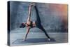 Woman Practicing Yoga in a Urban Background (Side Plank Pose, Vasisthasana)-Luna Vandoorne-Stretched Canvas