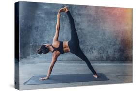 Woman Practicing Yoga in a Urban Background (Side Plank Pose, Vasisthasana)-Luna Vandoorne-Stretched Canvas