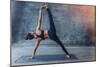 Woman Practicing Yoga in a Urban Background (Side Plank Pose, Vasisthasana)-Luna Vandoorne-Mounted Photographic Print